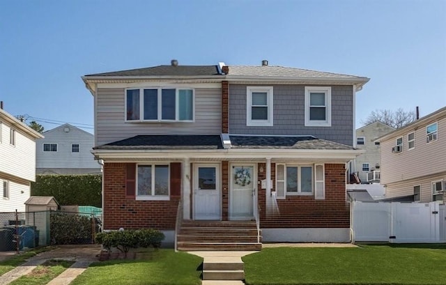 74 E Brandis Ave, Staten Island, NY 10308 - view of front facade featuring brick siding and entry steps
