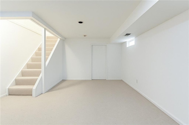 74 E Brandis Ave, Staten Island, NY 10308 - basement featuring carpet floors, stairway, and baseboards