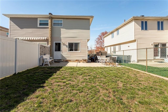 74 E Brandis Ave, Staten Island, NY 10308 - back of house featuring a patio area