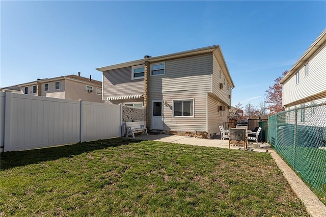 74 E Brandis Ave, Staten Island, NY 10308 - rear view of house with a patio