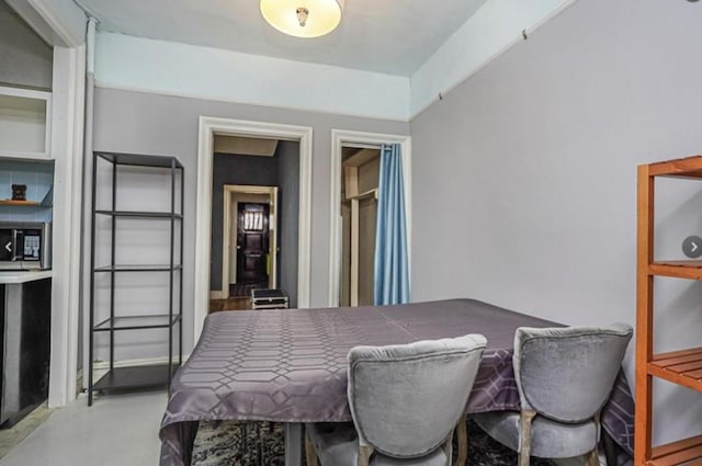 bedroom with concrete flooring