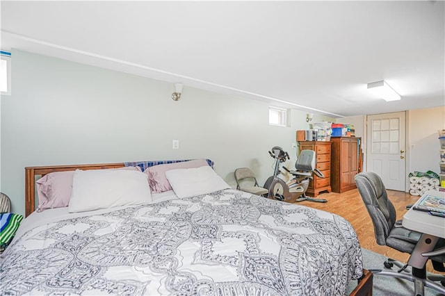 bedroom with wood finished floors