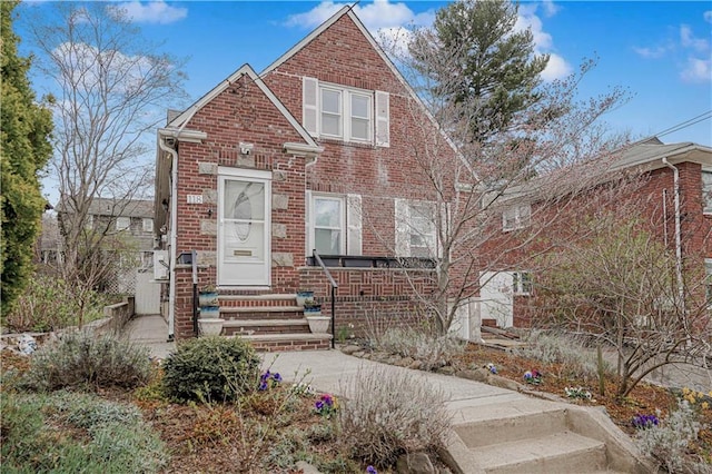 view of front of home with brick siding
