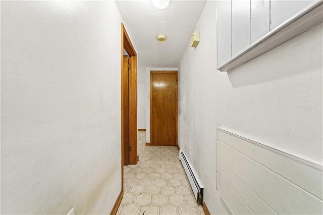 2554 W 16th St, Brooklyn, NY 11214 - hall featuring a baseboard radiator and light flooring