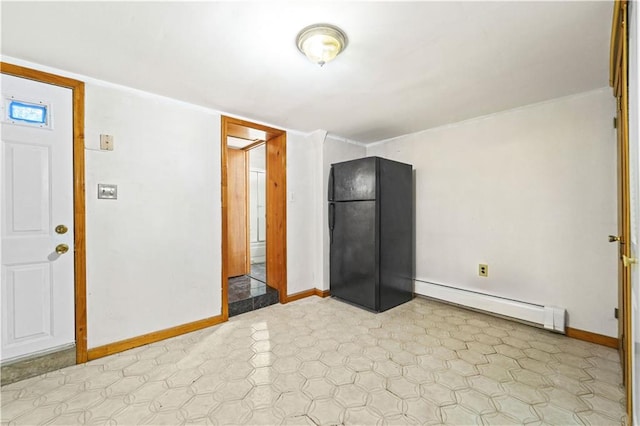 2554 W 16th St, Brooklyn, NY 11214 - empty room with baseboard heating and light flooring
