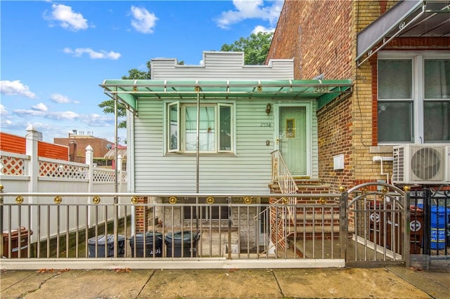 2554 W 16th St, Brooklyn, NY 11214 - view of front of house with a fenced front yard and entry steps