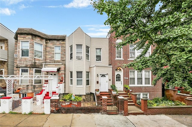 651 20th St, Brooklyn, NY 11218 - multi unit property featuring a fenced front yard and a gate