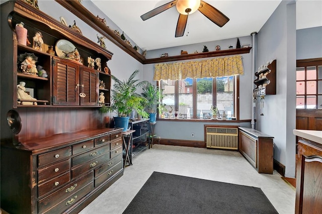 651 20th St, Brooklyn, NY 11218 - office with a ceiling fan, radiator heating unit, and built in study area