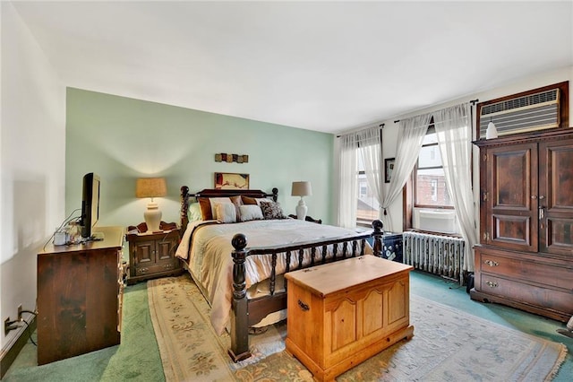 651 20th St, Brooklyn, NY 11218 - carpeted bedroom with radiator heating unit, an AC wall unit, and cooling unit