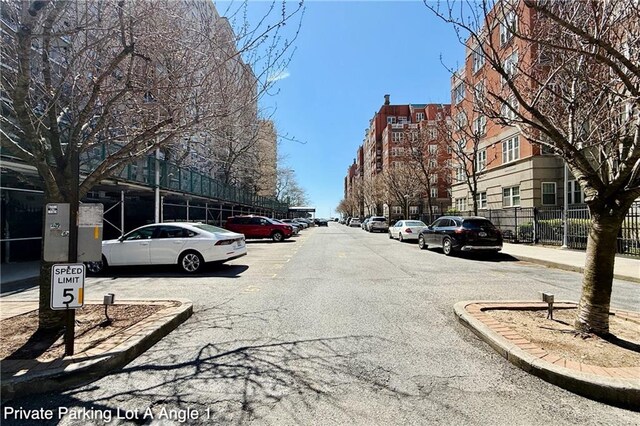 35 Seacoast Ter Unit 16D, Brooklyn, NY 11235 - view of asphalt road featuring curbs and sidewalks