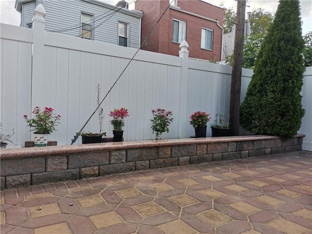 view of patio with fence