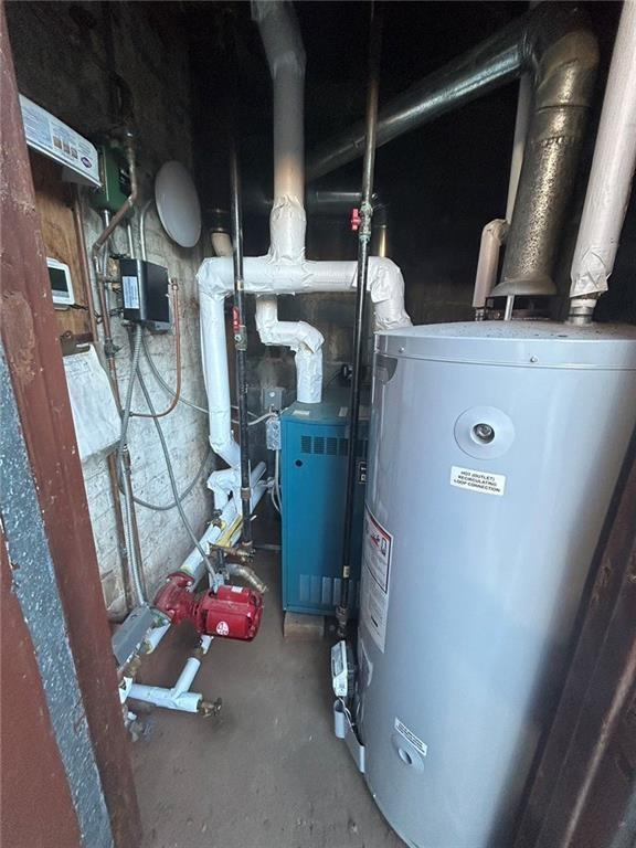 utility room with water heater
