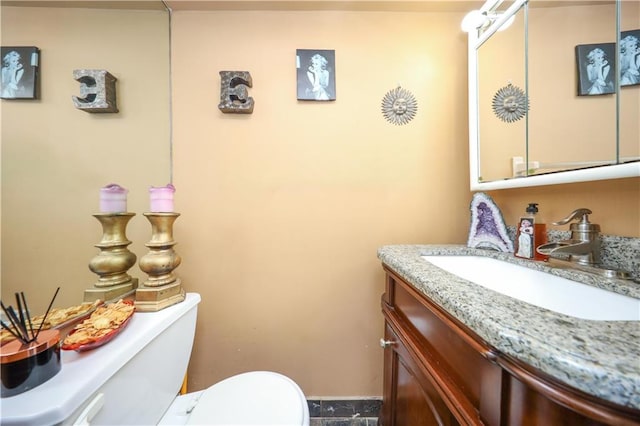 half bath with toilet and vanity