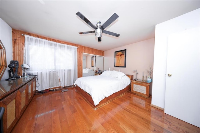bedroom featuring hardwood / wood-style flooring and ceiling fan