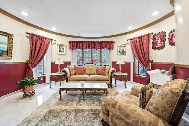 living area featuring baseboards, recessed lighting, and ornamental molding