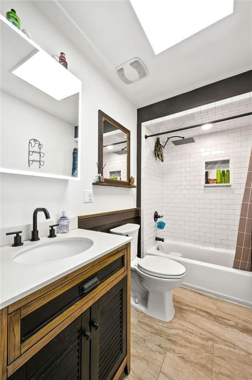 full bathroom with toilet, vanity, and shower / bath combination with curtain