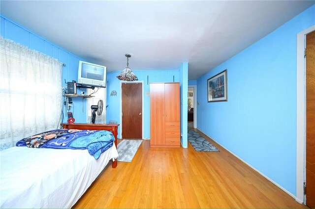 2939 Brighton 3rd St, Brooklyn, NY 11235 - bedroom with baseboards and light wood-type flooring