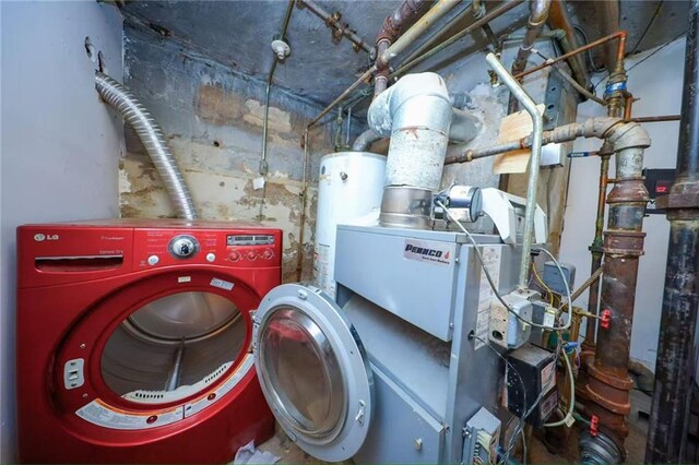 2939 Brighton 3rd St, Brooklyn, NY 11235 - interior space with laundry area, washer and clothes dryer, and water heater