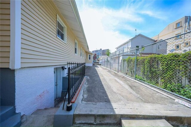 2939 Brighton 3rd St, Brooklyn, NY 11235 - view of home's exterior with fence