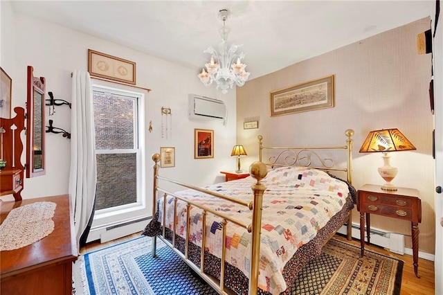 173 Hicks St Unit 4E, Brooklyn, NY 11201 - bedroom featuring a chandelier, wood finished floors, baseboard heating, and a wall unit AC