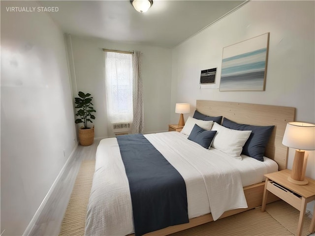 2518 W 1st St, Brooklyn, NY 11223 - bedroom featuring wood finished floors and baseboards