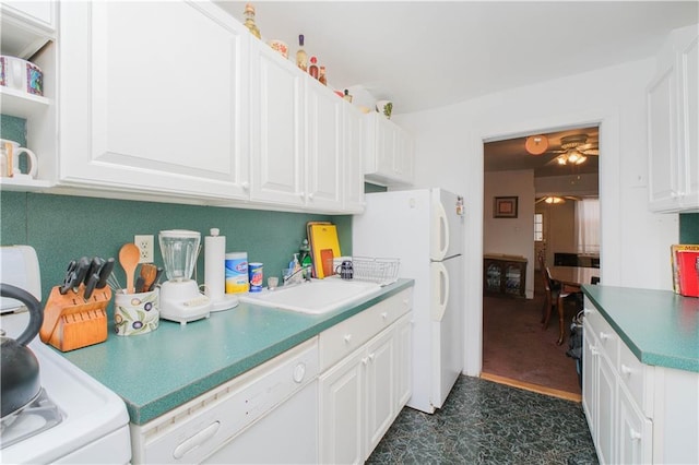 266 Wakeman Pl, Brooklyn, NY 11220 - kitchen featuring white cabinets, a ceiling fan, a sink, and white appliances