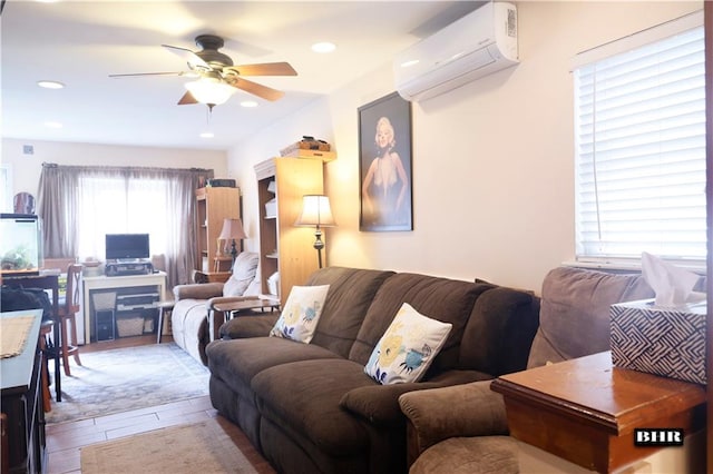 103 Abbey Ct, Brooklyn, NY 11229 - living room with a wall mounted AC, a ceiling fan, wood finished floors, and recessed lighting