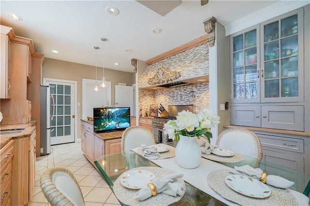 dining area featuring light tile patterned flooring and recessed lighting