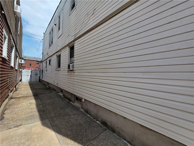 1462 E 92nd St, Brooklyn, NY 11236 - view of side of home featuring a gate