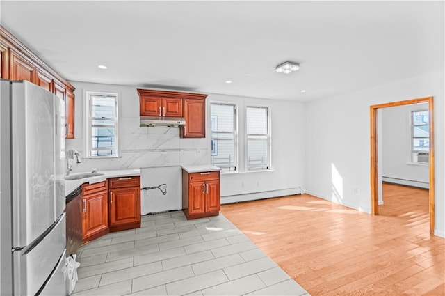 1462 E 92nd St, Brooklyn, NY 11236 - kitchen featuring freestanding refrigerator, baseboard heating, a sink, healthy amount of natural light, and recessed lighting