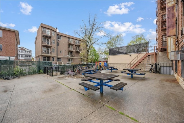 2800 Coyle St Unit 318, Brooklyn, NY 11235 - surrounding community with stairs, playground community, and fence
