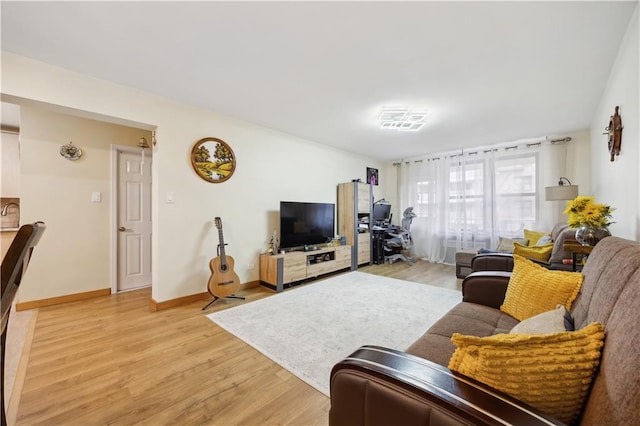 2800 Coyle St Unit 318, Brooklyn, NY 11235 - living area featuring baseboards and light wood-type flooring