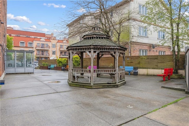 2800 Coyle St Unit 318, Brooklyn, NY 11235 - view of community featuring fence, a gazebo, and a patio area
