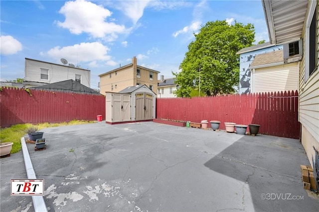 1378 E 93th St, Brooklyn, NY 11236 - view of patio / terrace with a shed, an outbuilding, and a fenced backyard