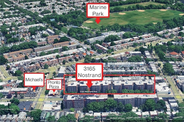 aerial map of property and surrounding area featuring property boundaries highlighted