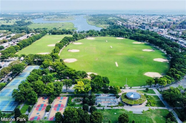 aerial view of a large body of water and a golf course