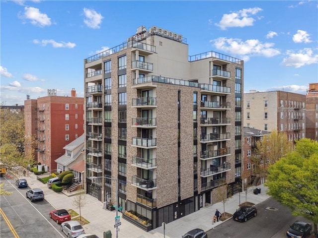 623 H Ave Unit 7C, New York, NY 11230 - view of apartment building / complex featuring uncovered parking
