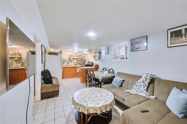 1639 Hendrickson St, Brooklyn, NY 11234 - living area with light tile patterned floors and bar area