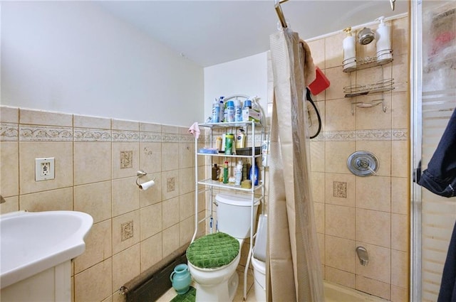 1639 Hendrickson St, Brooklyn, NY 11234 - bathroom featuring tile walls, a stall shower, toilet, and wainscoting