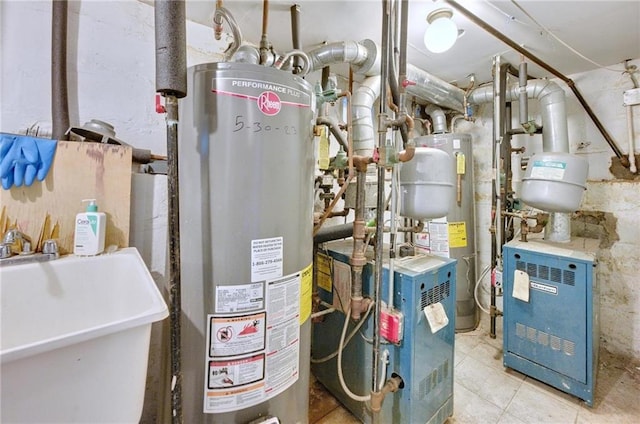1639 Hendrickson St, Brooklyn, NY 11234 - utility room featuring water heater and a heating unit