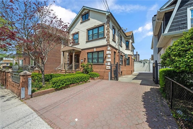 1639 Hendrickson St, Brooklyn, NY 11234 - view of front of home featuring brick siding and stucco siding