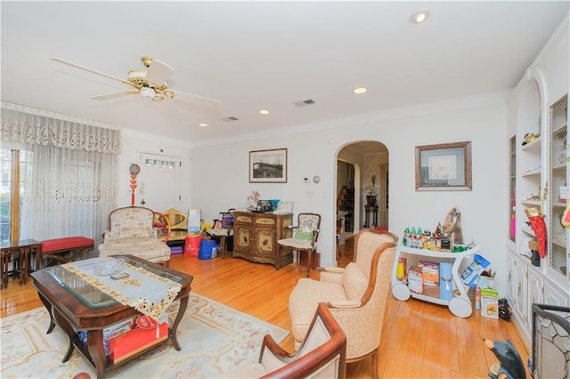 28 Devon Pl, Staten Island, NY 10301 - living area featuring arched walkways, wood finished floors, a ceiling fan, and recessed lighting