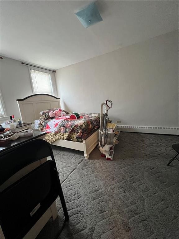 1774 E 54th St Unit 13B, Brooklyn, NY 11234 - carpeted bedroom with a baseboard heating unit