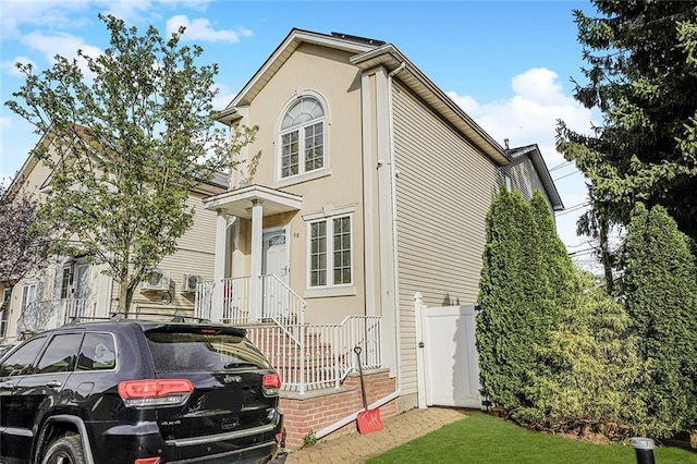 view of front of house featuring stucco siding