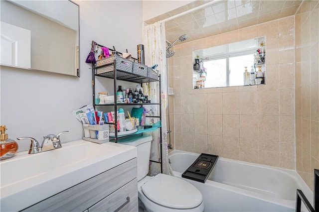 full bath with vanity, shower / bath combo with shower curtain, and toilet