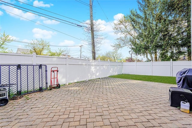view of patio with a fenced backyard