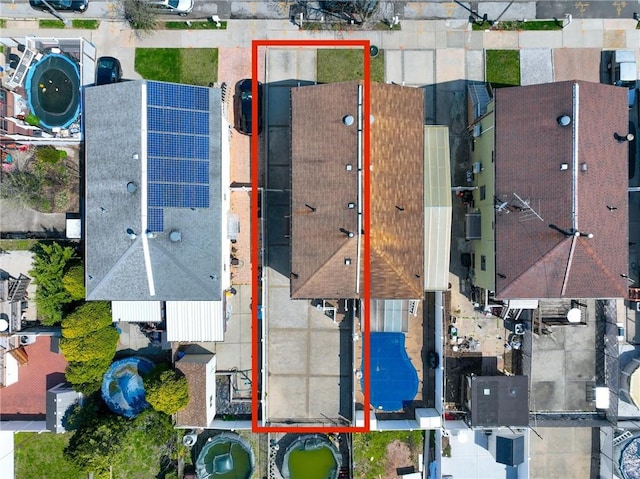 aerial view of property and surrounding area with property parcel outlined