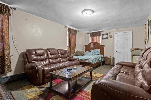 living area featuring carpet