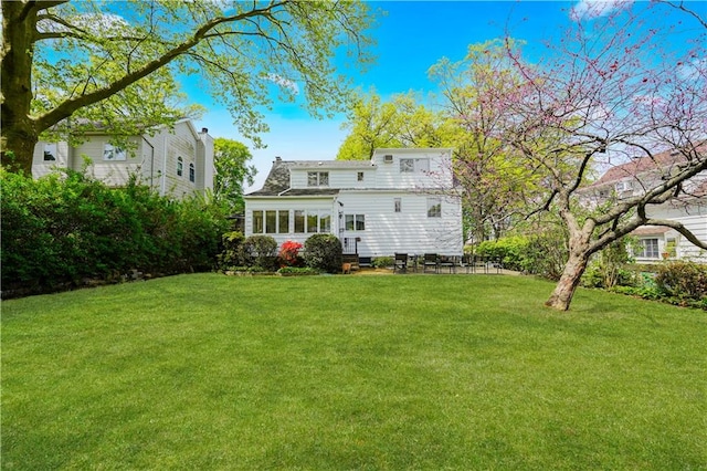 249 Slosson Ave, Staten Island, NY 10314 - back of property featuring a lawn