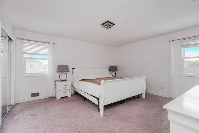 149 Forest St, Staten Island, NY 10314 - bedroom featuring light carpet and baseboards